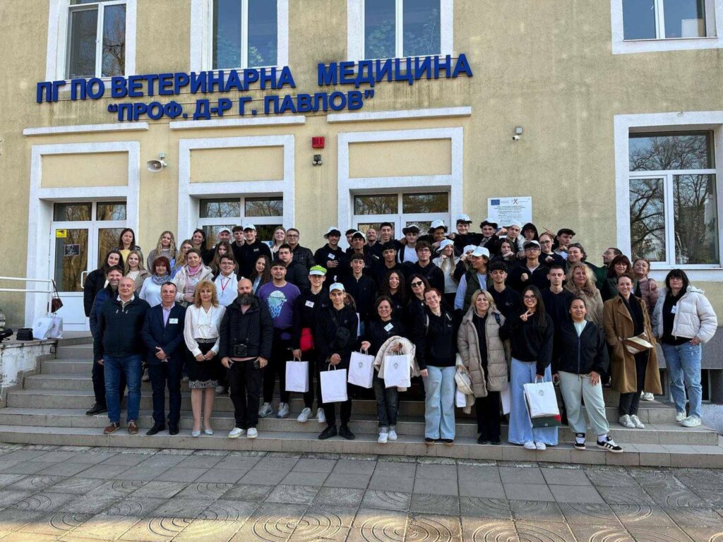 Group photo in front of the partner school